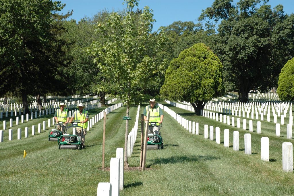 A crew from Blades of Green working to aerate an area over 8 acres at Arlington National Cemetery. PHOTO: Danielle Lanning