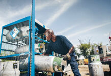 Contractor Loading Propane Tanks